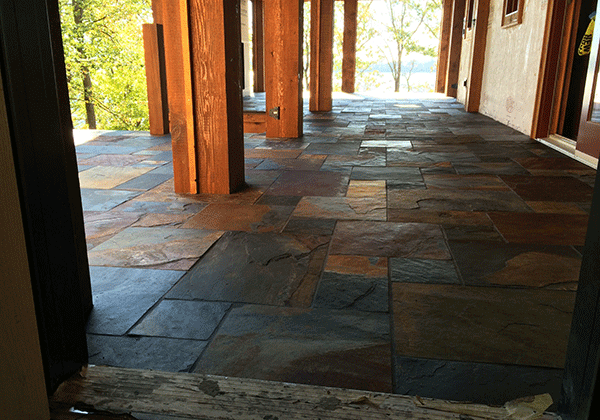 Slate tile flooring installed on outside porch by Pro Floor & Tile.